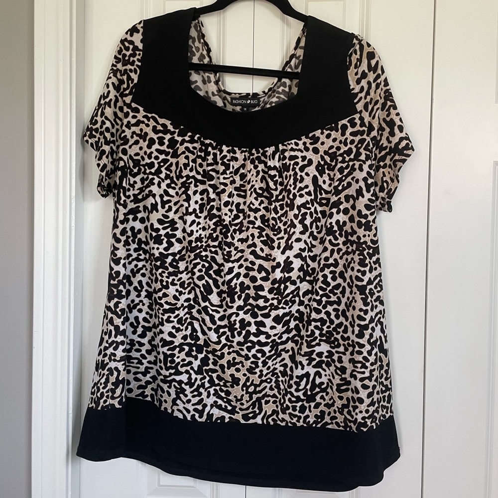 Cheetah print woman’s blouse